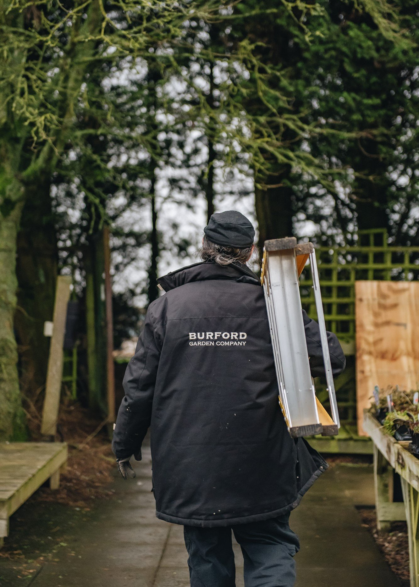 Maintenance Assistant walking at Burford Garden Co.